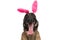 Happy belgian shepherd puppy with bunny ears sticking out tongue