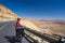 Happy biker relax on beautiful road in Israel desert. Sunny hot day