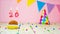 Happy birthday for 20 years. Festive background with muffin. Copy the birthday card for a twenty year old on a pink background.