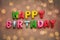 Happy Birthday alphabet text on wall background
