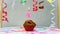 Happy birthday background with muffin with beautiful decorations with number candles 4. Colorful festive card happy birthday with