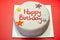 Happy Birthday Cake, Sponge cake layered with a sweet frosting and raspberry jam, decorated with soft icing decorations