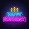Happy birthday neon sign. Birthday card in the shape of a cake with candles on a dark background