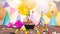 Happy birthday with a number of candles for four years on the background of balloons. A festive muffin with burning candles