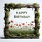 Happy birthday , thin frame made from thick moss covered Wood branches and leaves.