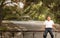 Happy Black African American boy sitting on iron gate