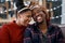 Happy black couple, sofa and christmas in home living room together, sitting and celebration. Black woman, man and smile