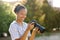 Happy black photographer posing