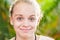 Happy blond Caucasian teenage girl portrait