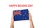 Happy boxing day. Box with New Zeland flag in male hands. White background