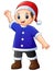 Happy boy in blue santa claus costume and xmas red hat