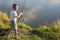 Happy boy caught a fish. Boy fishing on a lake. Child holding fishing rod. Little fisherman