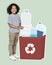 Happy boy collecting plastic bottles in a recycling box