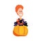 Happy boy in costume with pumpkin candies