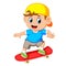 Happy boy playing skateboard