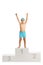 Happy boy in swimming trunks standing on a winners pedestal hold
