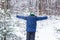 Happy boy throwing snow. Child, season and winter concept.