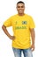 Happy brazilian foorball fan with yellow jersey