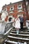 Happy bride and groom on background of ancient castle