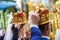 Happy bride groom in crowns at wedding ceremony in church