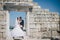 Happy bride and groom posing in a park