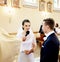 Happy Bride promises to love future husband in the church.