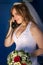 Happy bride talking phone