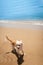 Happy bright chihuahua on tropical beach