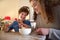 Happy brother and sister eating food