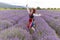 Happy Bulgarian girl in a lavender field