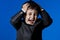 Happy business, cute little boy portrait over blue chroma background