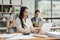 Happy business lady working on laptop in office, Asian happy beautiful businesswoman in formal suit work in workplace