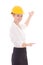 Happy business woman architect in yellow builder helmet pointing