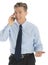 Happy Businessman Gesturing While Answering Smart Phone