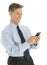 Happy Businessman Text Messaging Through Smart Phone