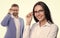 happy businesspeople look in eyewear at studio. couple of businesspeople look in eyewear