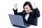 Happy businesswoman cheering in front of laptop