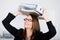 Happy Businesswoman Placing Binders On Head In Office