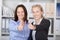 Happy Businesswomen Showing Thumbs Up Sign