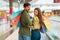 Happy Buyers Couple Shopping Posing Holding Shopper Bags In Mall