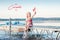 Happy Canada Day. Greeting card with text. Caucasian girl sitting on dock pier by lake and waving Canadian flag. Celebration of