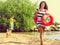 Happy carefree family walking on beach at sea.