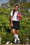 Happy Catholic Female Student Wearing School Uniform