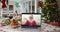 Happy caucasian santa claus on laptop lying on christmas table