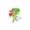 Happy celery plant cartoon character mascot with heart