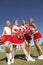 Happy Cheerleaders On Field