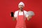 Happy chef cook or baker man in striped apron toque chefs hat isolated on red background. Cooking food concept. Mock up