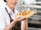 Happy Chef Holding Tray With Stuffed Ravioli Pasta