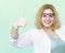 Happy chemist woman with thumb up gesture isolated