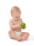 Happy child baby toddler sitting in diaper with green apple